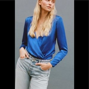 Zara beautiful blue bodysuit with shoulder pads and surplice deep V line